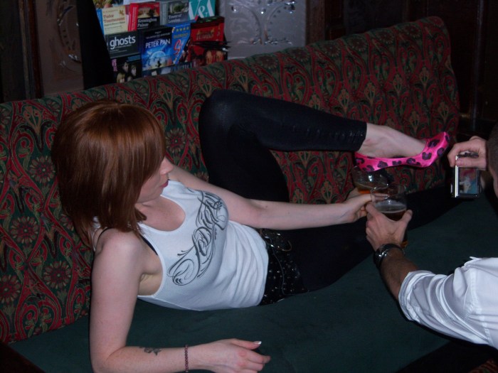 Alex Sim Wise on couch