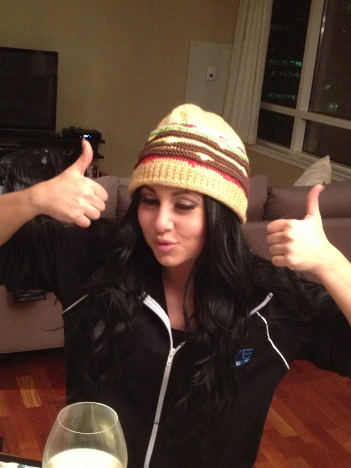 Olivia in cheeseburger hat