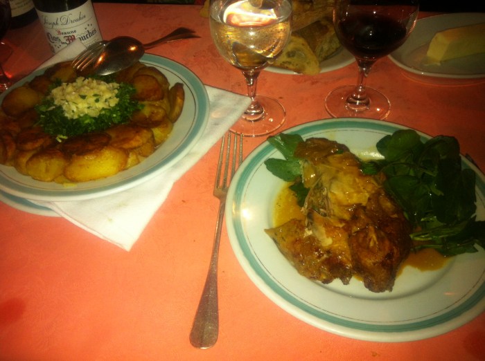 Chez L'Ami Louis chicken dish at table