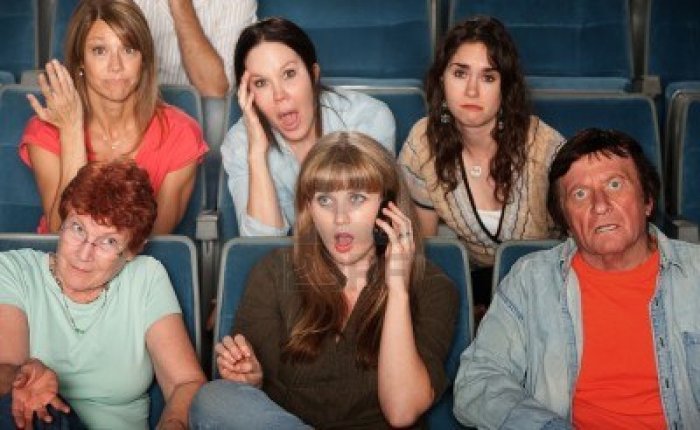 loud-woman-on-phone-annoys-audience-in-theater