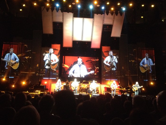 The Eagles harmonizing in concert