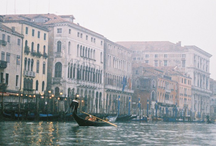 Foggy Venice canal and gondolas
