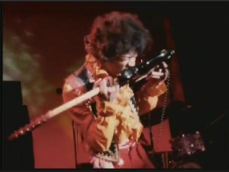 Jimi Hndrix teeth guitar playing