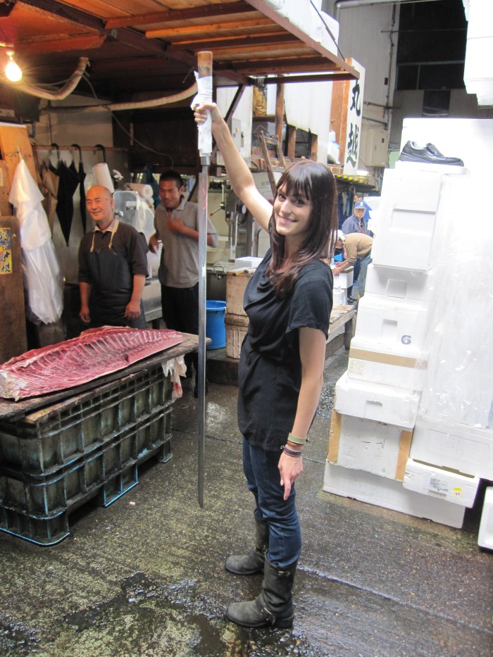 tokyo fish market morgan webb big sword pose