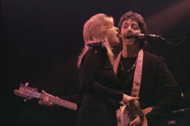 Former Beatle Paul McCartney and wife Linda on the opening night of his three sold-out concerts at London's Empire Pool, Wembley on October 19, 1976. (AP Photo/John Glanville)